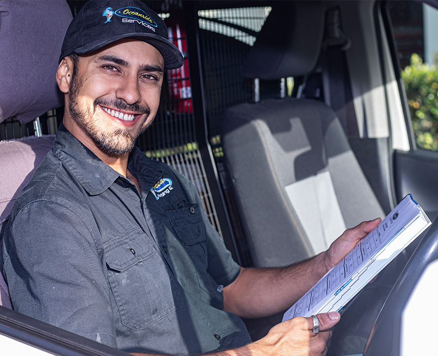 Smiling Technician Sitting in His Work Van — Reliable Local Plumbers in Gold Coast