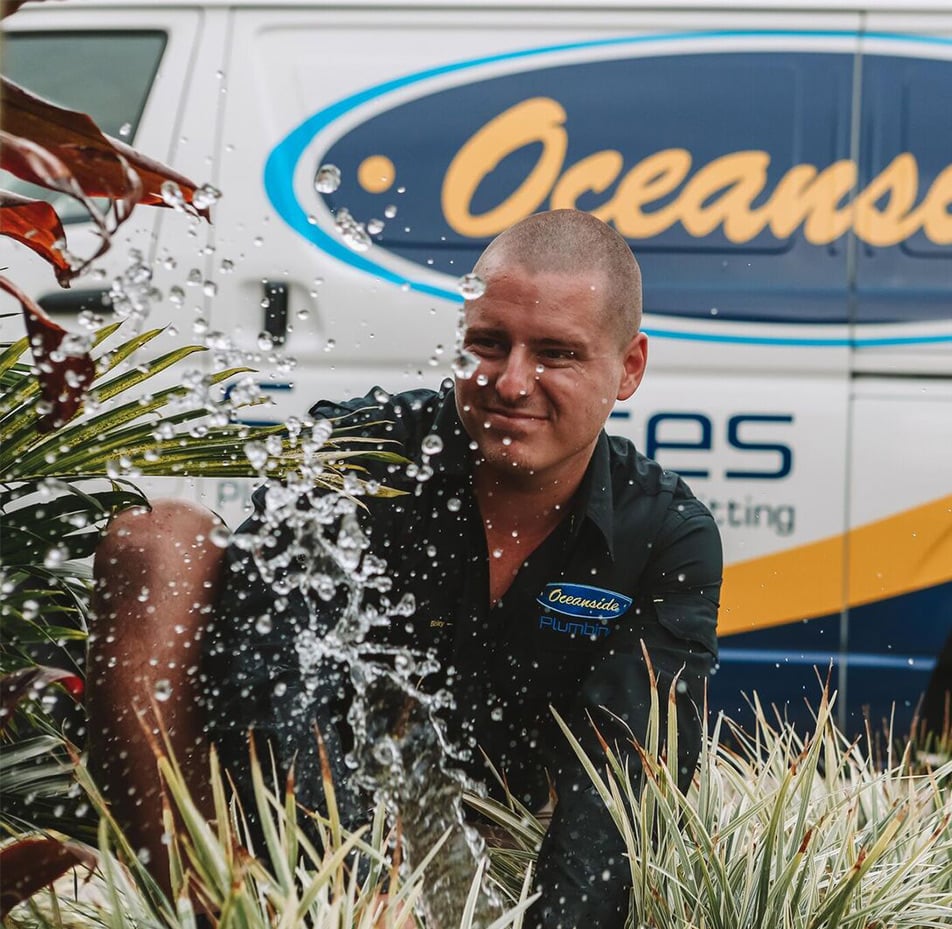 Oceanside Services Worker Fixing Water Leakage — Reliable Local Plumbers in Gold Coast