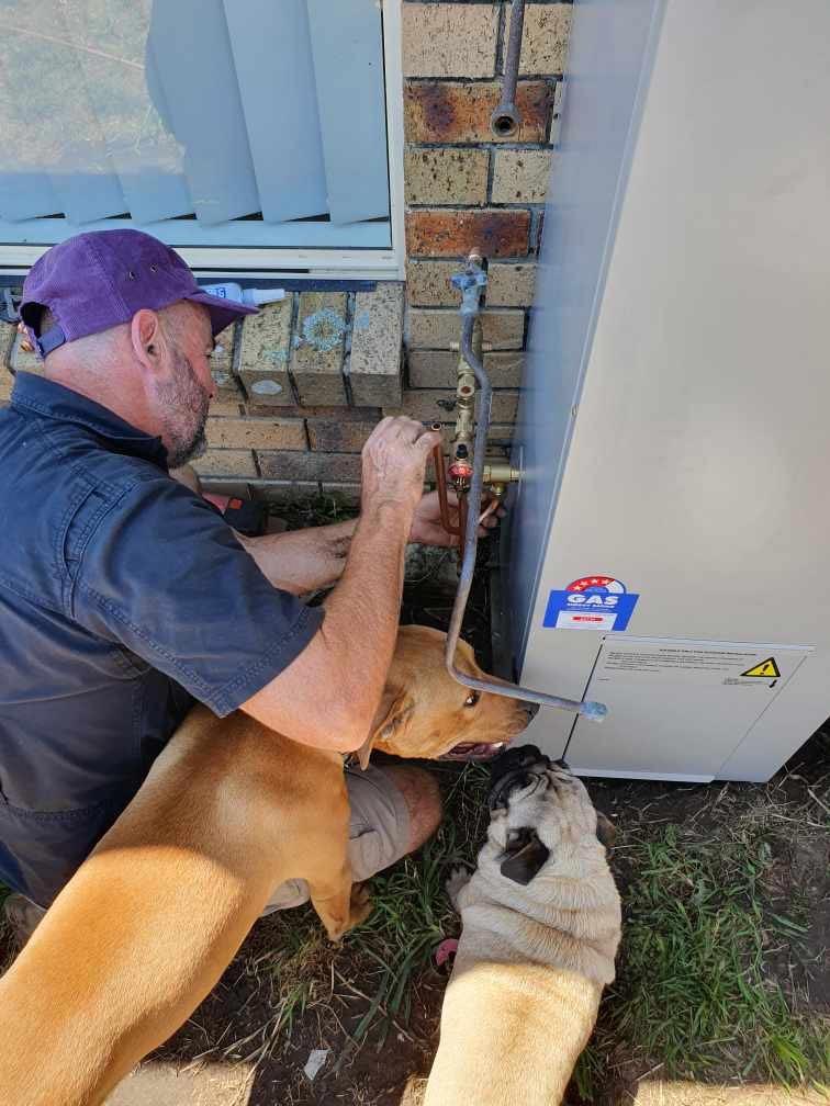 Gasfitter Checking A Gas Fitting System