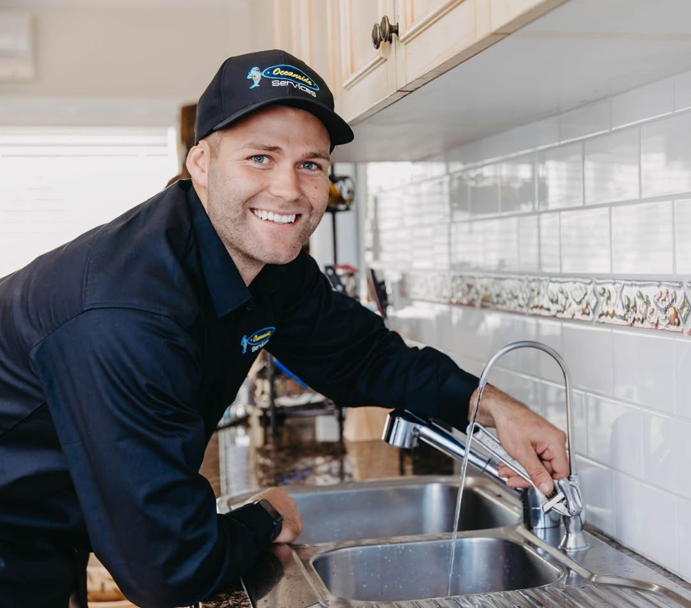 Man Repairing the Sink