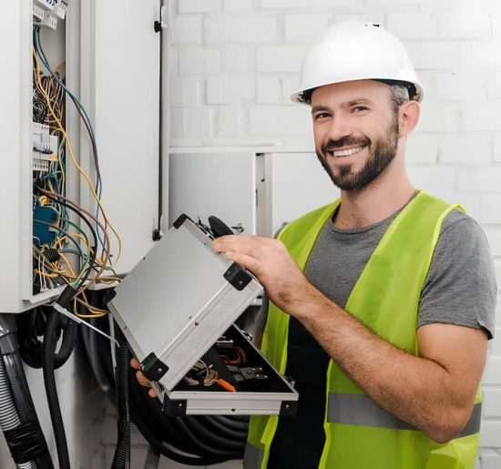 Smiling electrician — Reliable Local Electricians in Helensvale, QLD