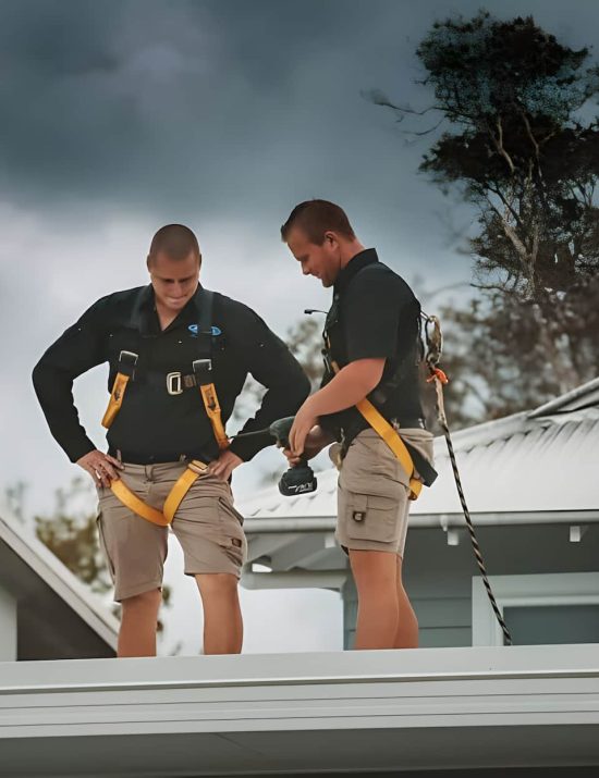 Workers on roof — Reliable Local Electricians in Helensvale, QLD