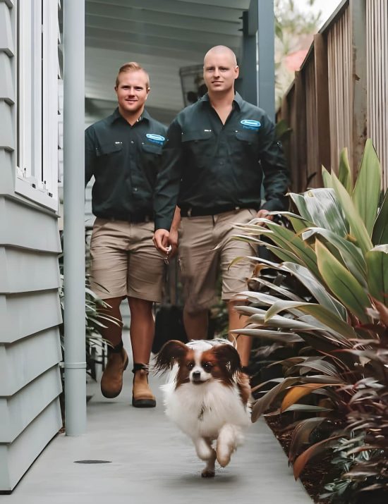 Plumbers walking — Reliable Local Electricians in Helensvale, QLD